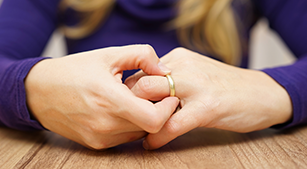 Woman Removing Wedding Ring